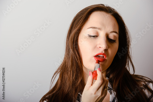 portrait of beautiful delicate woman red lipstick