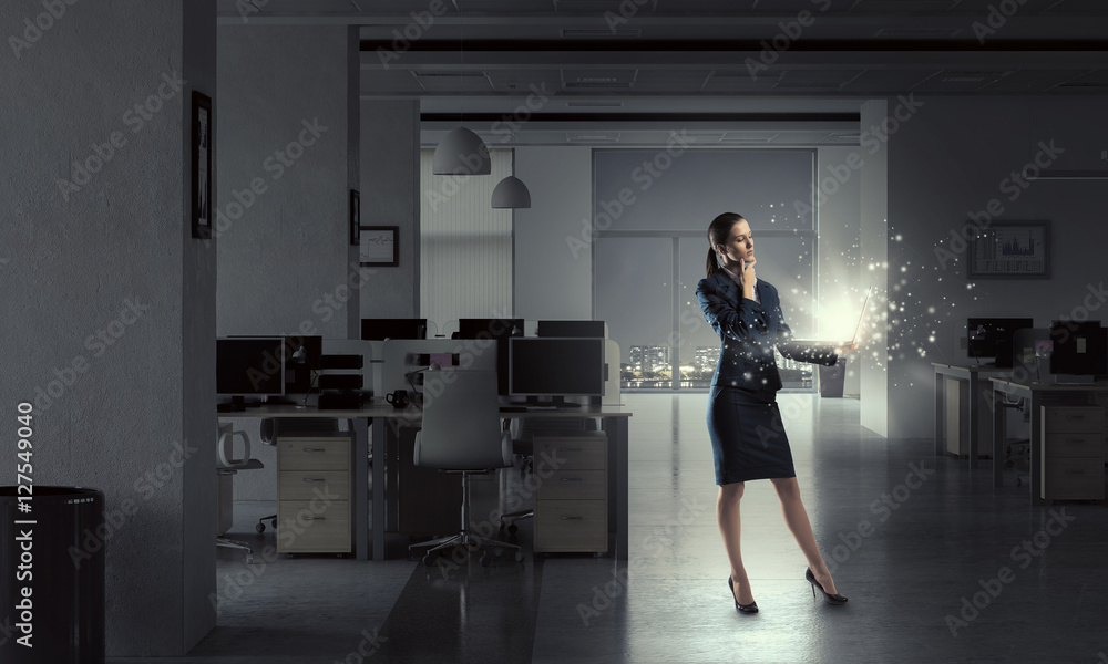 Elegant businesswoman thinking something over . Mixed media Elegant businesswoman thinking something over . Mixed media