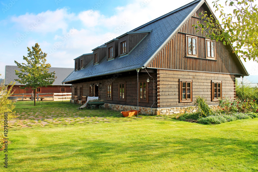 Obraz premium View of traditional european wooden village house. 