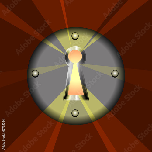 The light emitted from the metal keyhole on brown background