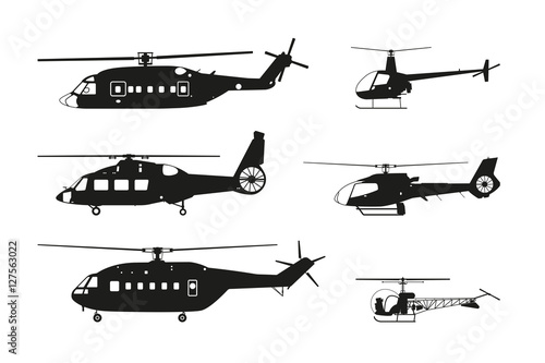 Black helicopter silhouette on a white background. Side view