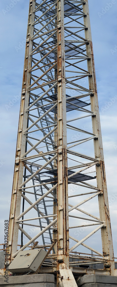 central fragment of a rusty construction crane