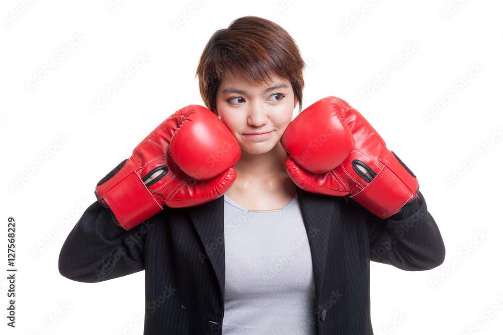 Young Asian business woman with red boxing gloves. Young Asian business woman with red boxing gloves.