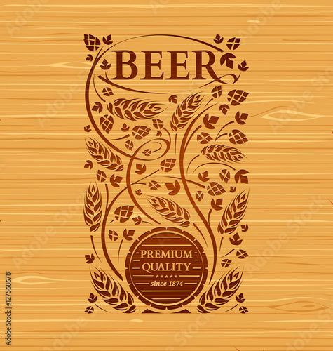 Vector beer emblem with hops and malton a wooden background photo