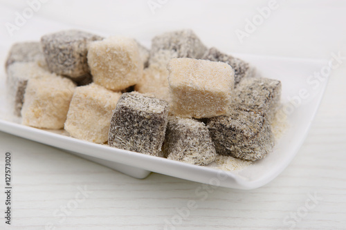 Turkish delight. Oriental sweets in white plate.