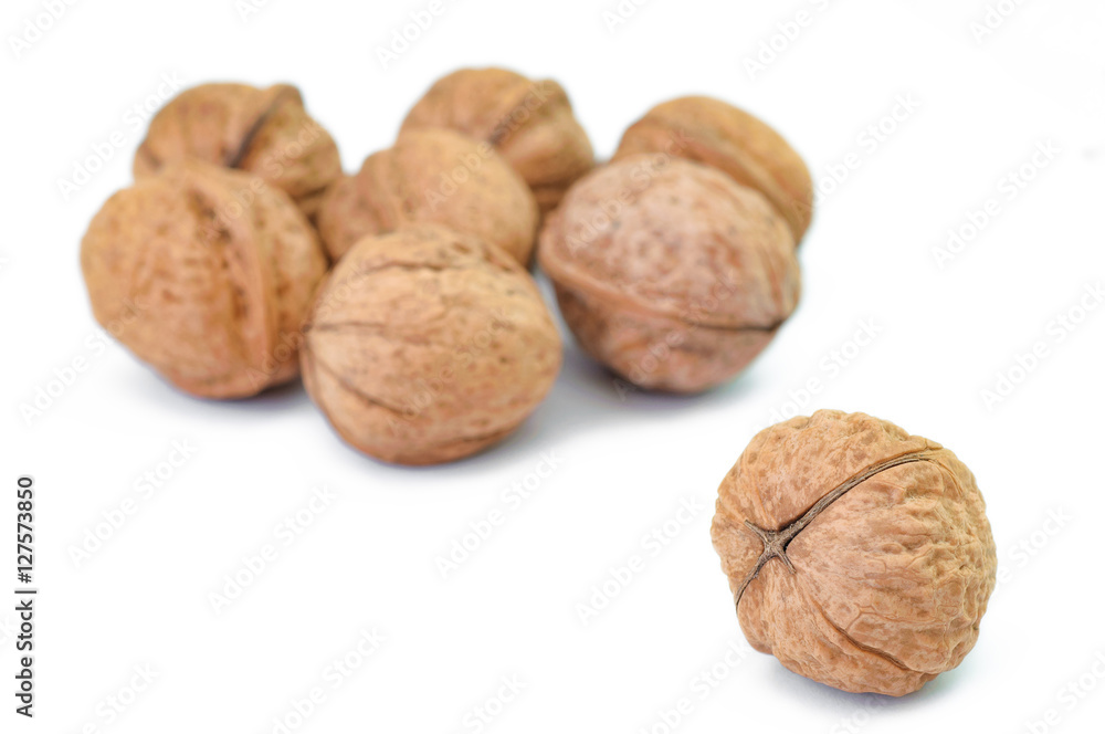 Bunch of ripe walnuts isolated on white background Bunch of ripe walnuts isolated on white background