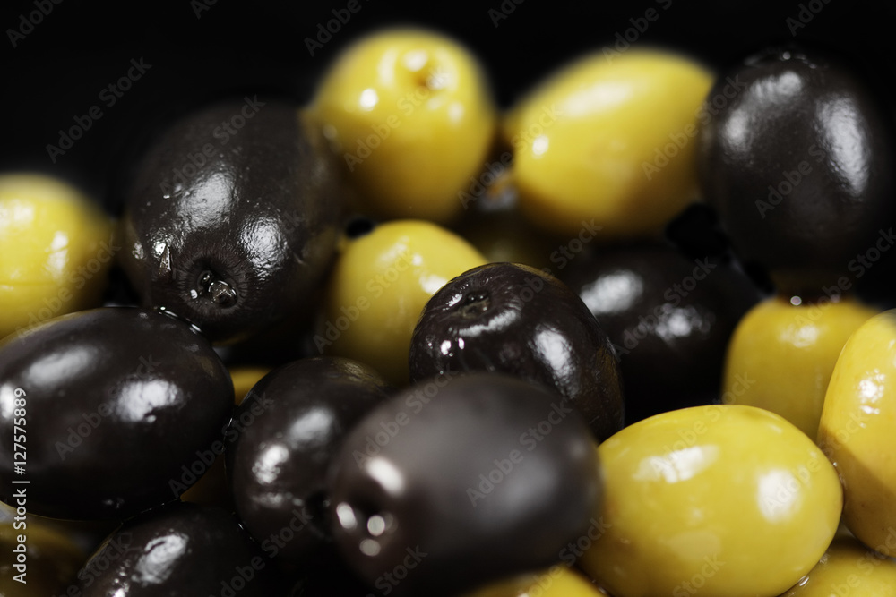 Black and green olives in a bulk Black and green olives in a bulk