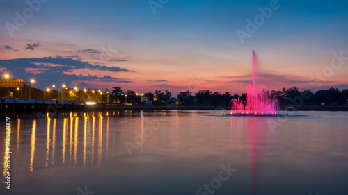 Beautiful fountain show with reflection on water