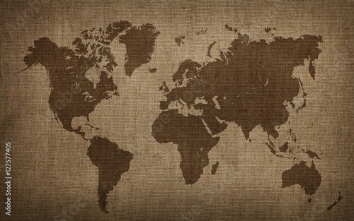 Brown world map on old vintage flax linen canvas