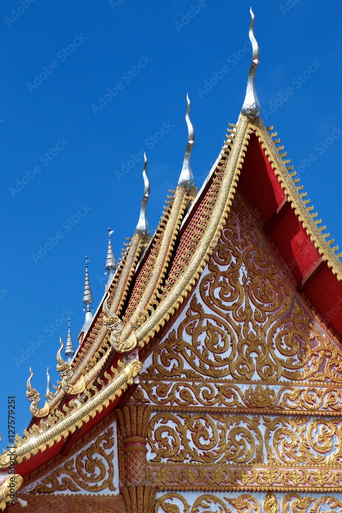 Wat Sri Mongkol Golden Top roof blue sky cloud