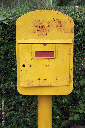 Old yellow mailbox
