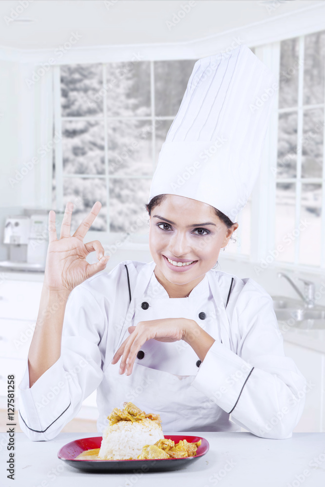 Chef showing perfect sign with delicious dish Chef showing perfect sign with delicious dish