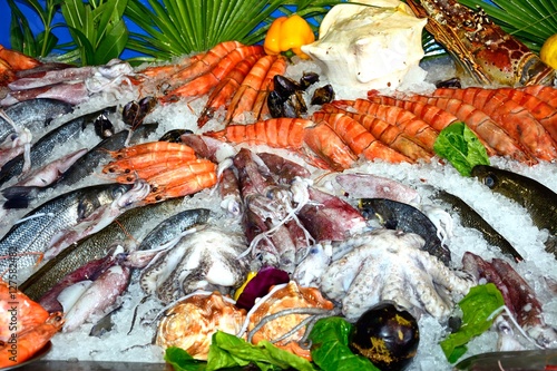 Fresh fish and seafood displayed outside a restaurant, Rethymno, Crete, Greece. photo