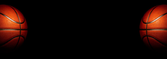 Basketball on a black background. panoramic background or basketball with blank space