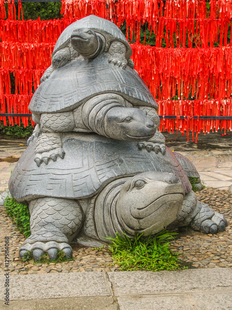 Three turtles statue at Hainan Park of longevity as symbol of family generations