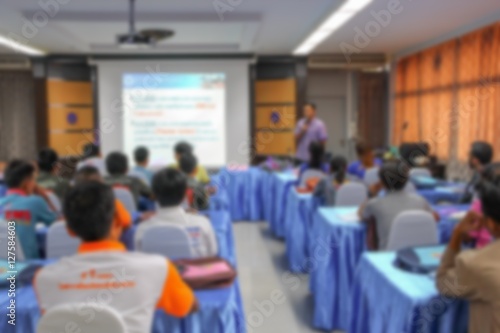 Wallpaper Mural blurred focus, student learning business sitting in classroom with teacher front  Torontodigital.ca