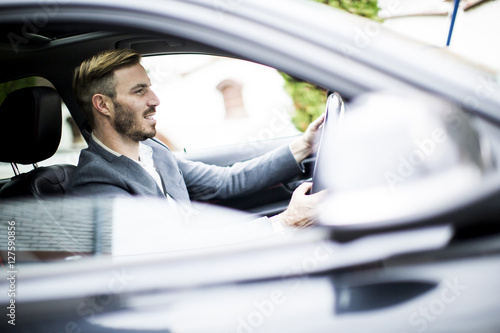 Young man in the car © BGStock72
