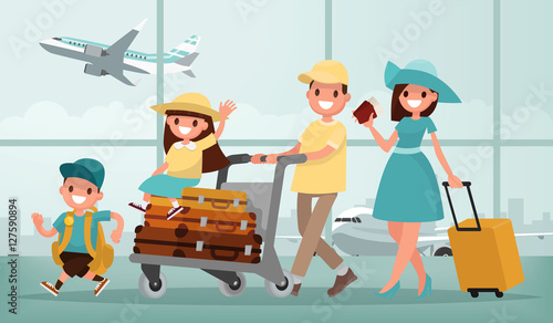 Family travel. Father mother, son and daughter at the airport. V