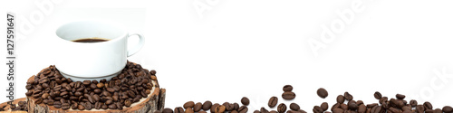 isolated cup of coffee and beans