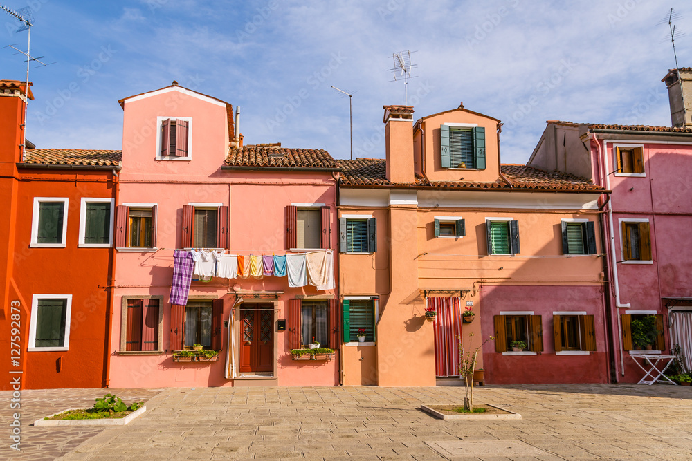Multi-colored houses and clothing line on the  island Burano, Ve