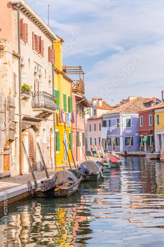Photography Very beautiful multi-colored houses along the canals on  the isl