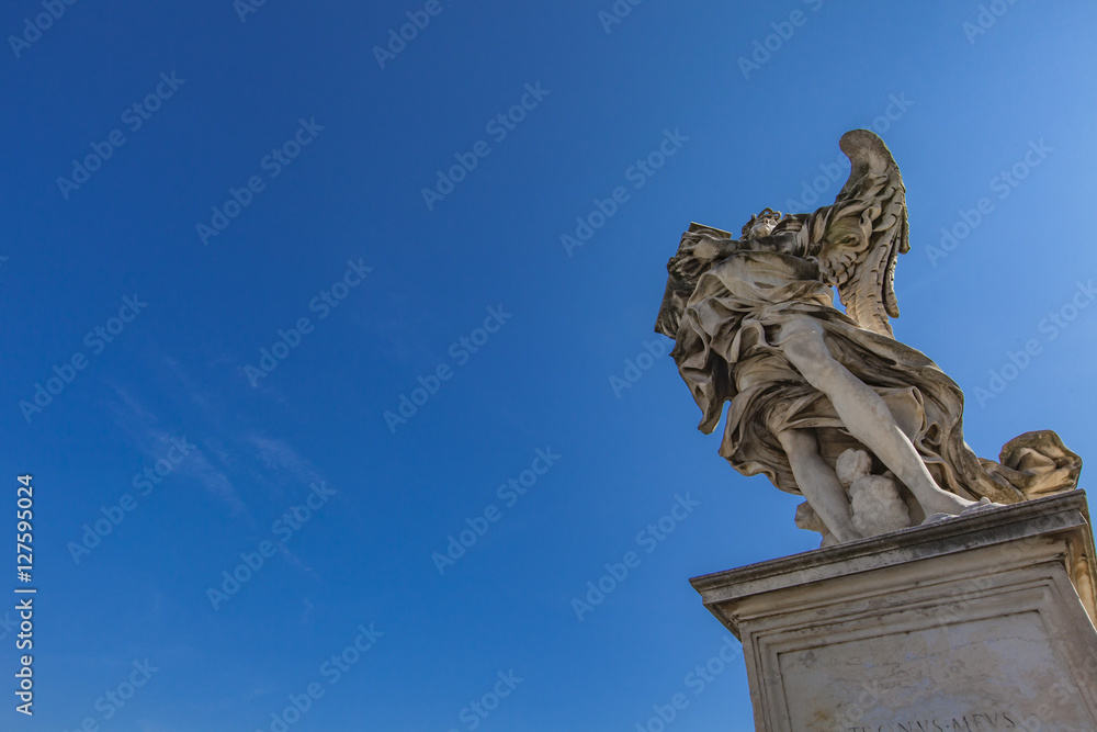 Angel statue at Sant Angelo Bridge in Rome Angel statue at Sant Angelo Bridge in Rome