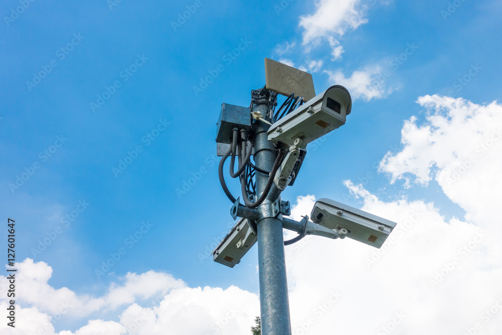 CCTV cameras, security cameras against blue sky with copy space
CCTV cameras, security cameras against blue sky with copy space