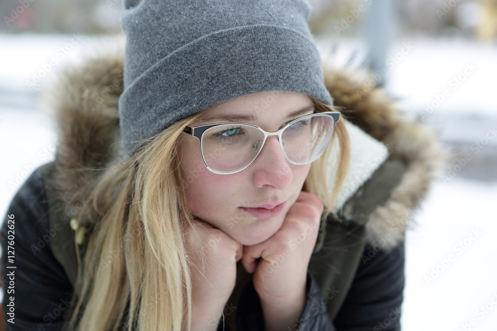 Portrait of thinking girl in glasses Portrait of thinking girl in glasses