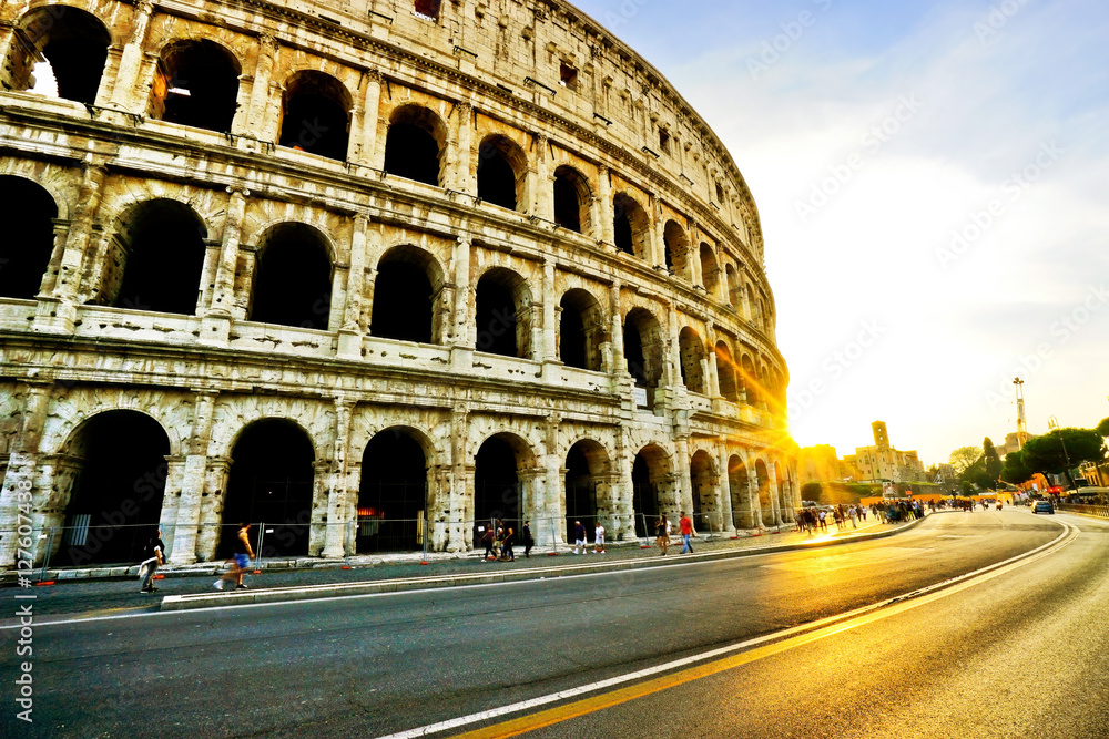 View of Colosseum at sunset in Rome, Italy.