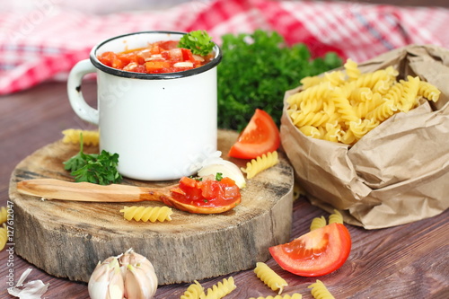 Tomato sauce with ingredients for pasta