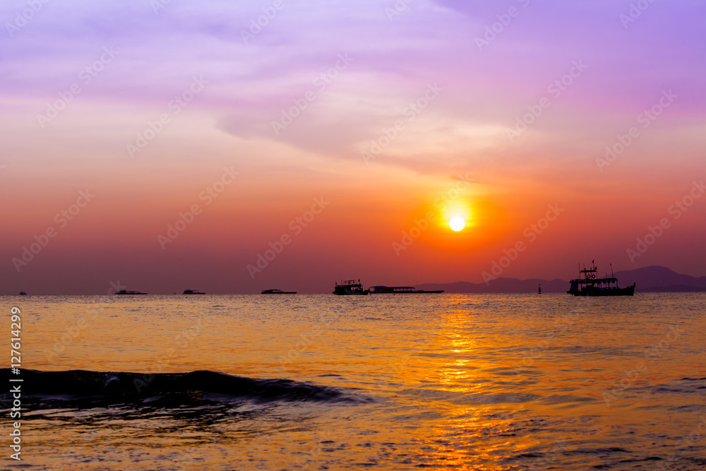 Beautiful landscape. sunset on the beach with fishing boat Beautiful landscape. sunset on the beach with fishing boat