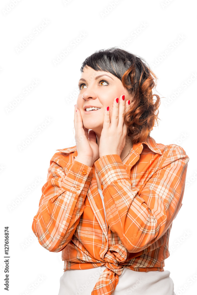 Woman shocked looking to the side, wearing an orange shirt Woman shocked looking to the side, wearing an orange shirt
