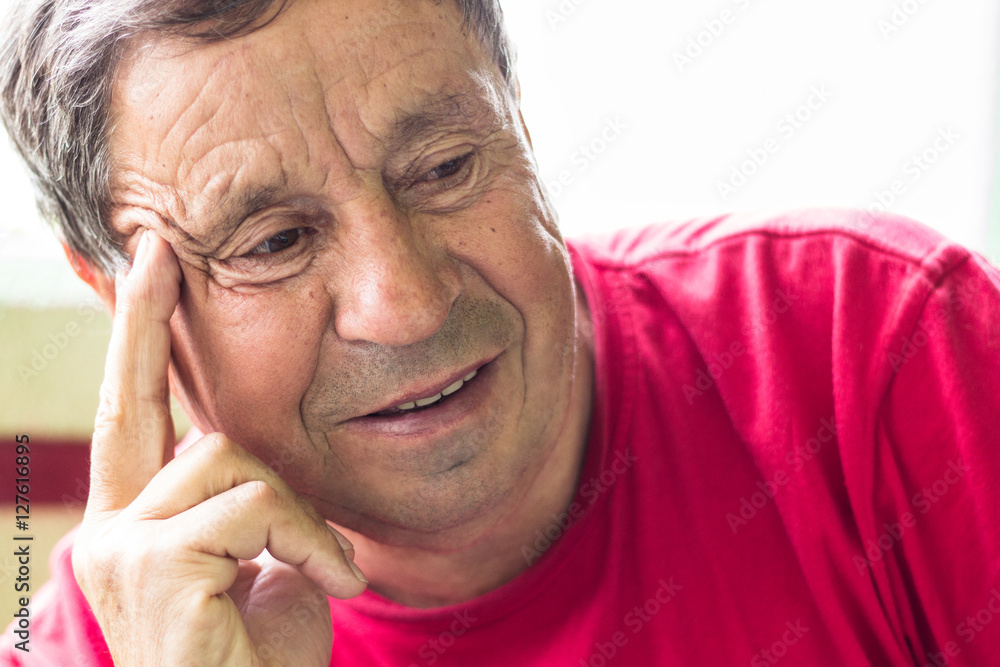 Elderly man looking away