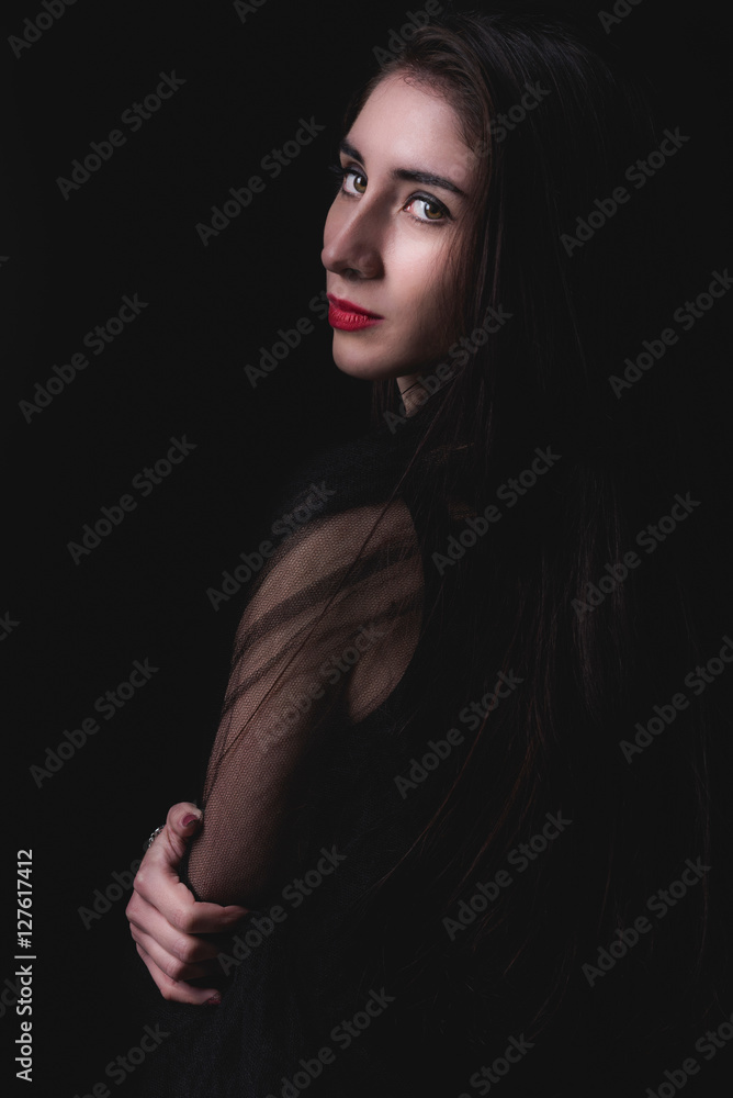 Female portrait on dark background Female portrait on dark background