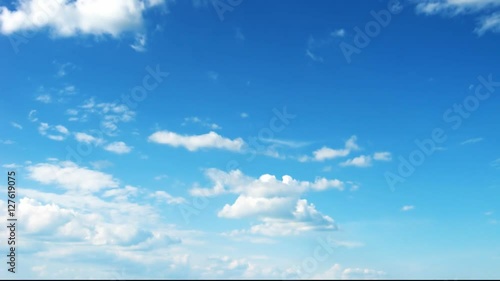 Time-lapse with light transparent clouds on background blue sky. FHD vedeo.