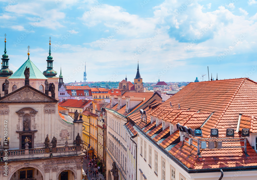 Obraz premium Panorama of the old part of Prague from the Old Town Bridge Tower. Old colorful Town architecture, Czech Republic.
