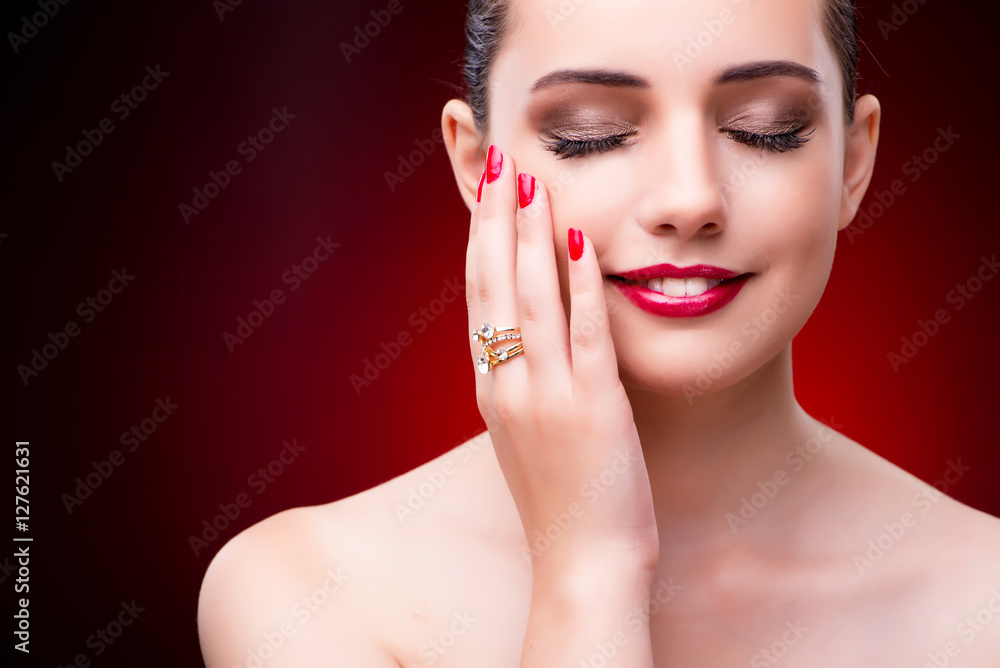 Woman in glamourous concept with jewelry Woman in glamourous concept with jewelry