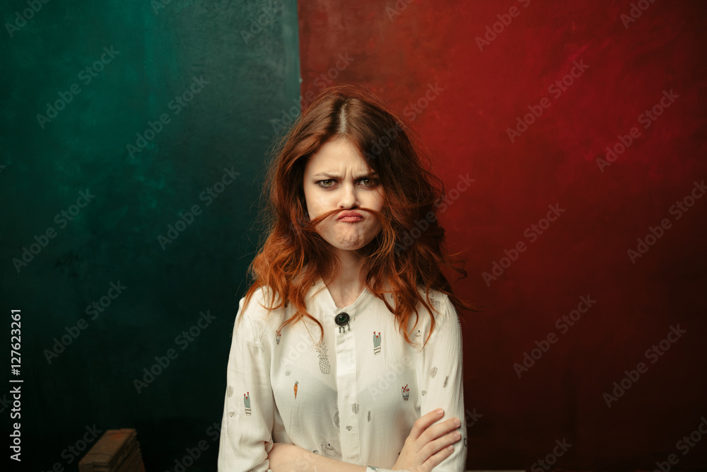 Beauty woman on a colored background. Woman surprised Beauty woman on a colored background. Woman surprised