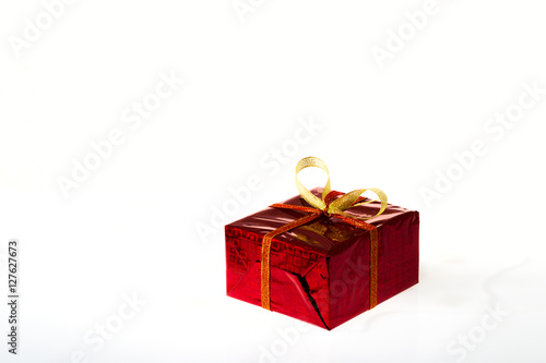 Gift box in colored box on a white background