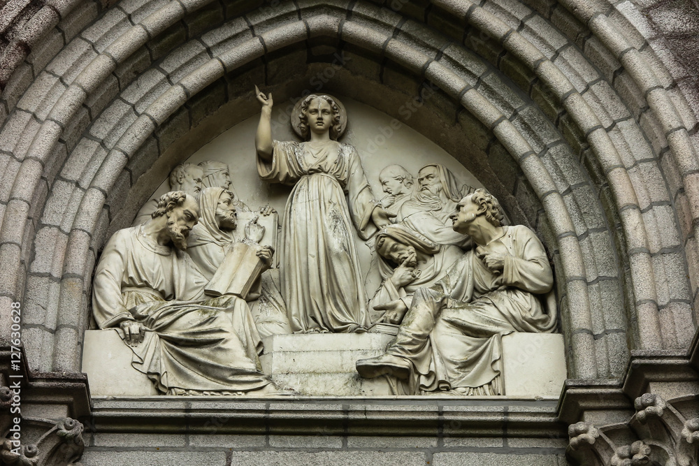 Jesus as wisdom among scholars, bas-relief above the door Chapel