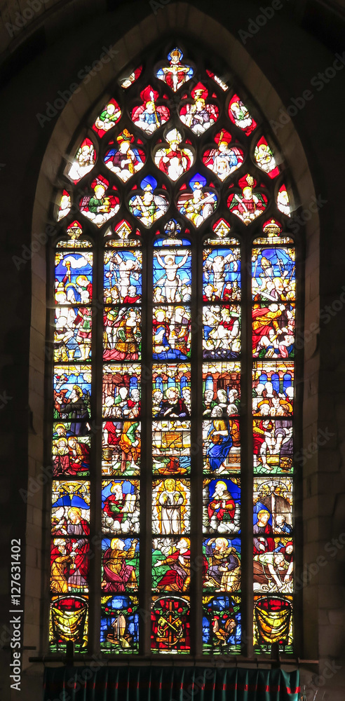 Iffendic, France - September 9, 2016: Stained glass window in th