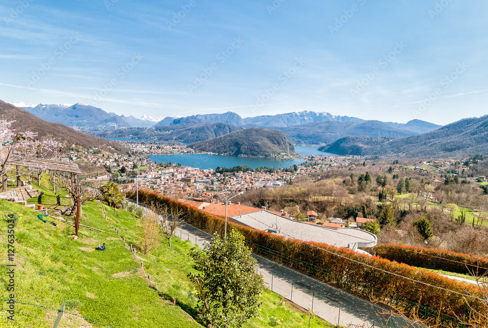 Panoramic view of Lake Lugano and the Swiss Alps from Cadegliano Viconago, Varese, Italy
