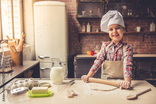 Little girl baking photo