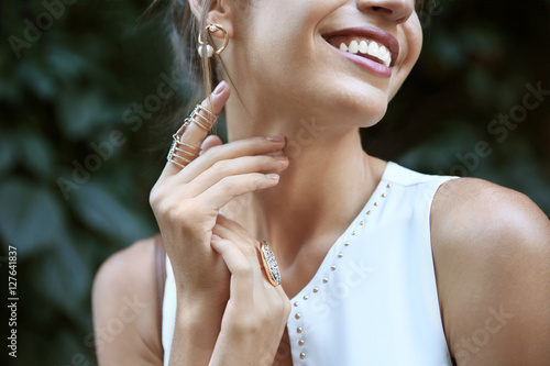 Young woman with stylish accessories, closeup