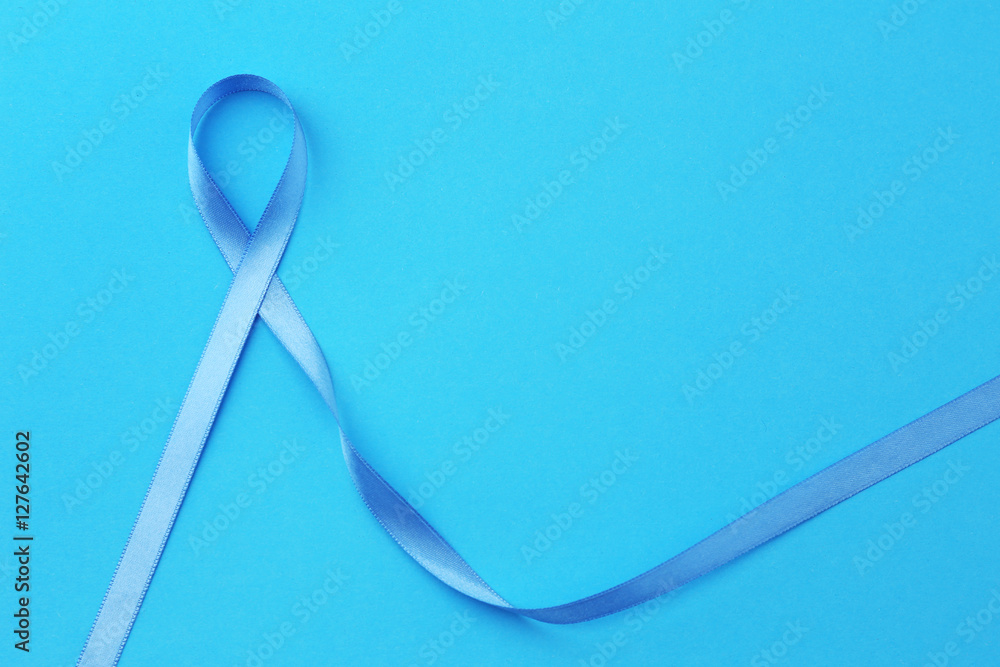 Light blue ribbon on color background. Prostate cancer concept Light blue ribbon on color background. Prostate cancer concept