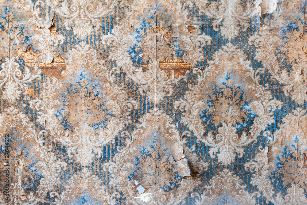 Vintage textures old wallpaper, peeling paint, brick wall and layers of different colorful