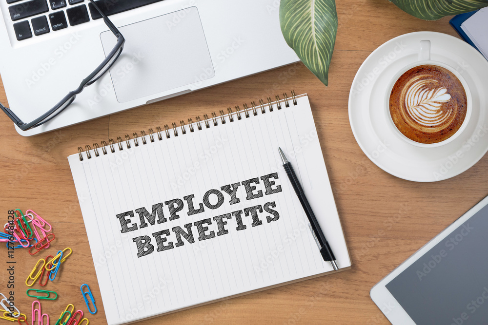 EMPLOYEE BENEFITS Man working on tablet TECHNOLOGY COMMUNICATION EMPLOYEE BENEFITS Man working on tablet TECHNOLOGY COMMUNICATION