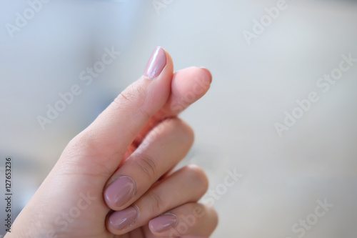 Close up action of woman hand in Mini heart soft focus,love symbolic of Korea.