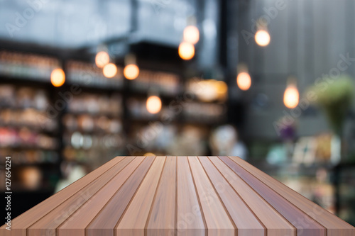 Perspective luxury wooden with blurred cafe background