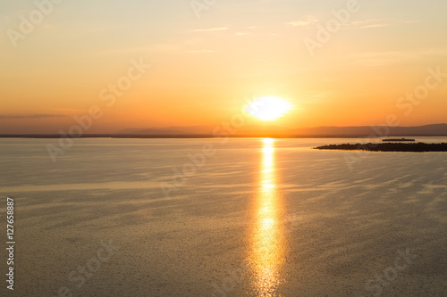 Fototapeta Naklejka Na Ścianę i Meble -  Scenic view of beautiful sunset above the lake.Ubonrat dam khonk